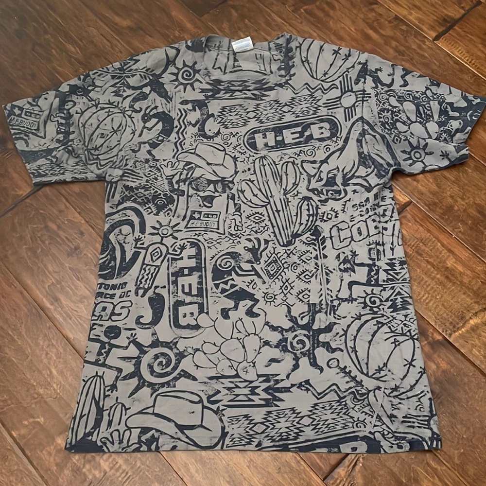 Small H-E-B Buddy Kokopeli graphic T-shirt